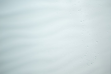 Drops of water on shower glass