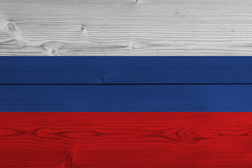 russia flag painted on old wood plank