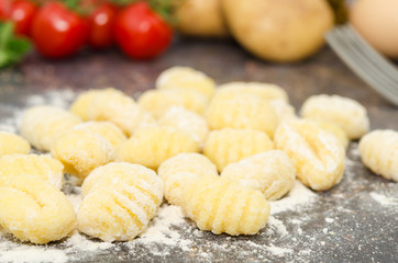 Uncooked fresh homemade gnocchi. Italian cuisine - raw gnocchi, made of potato, flour and egg. 