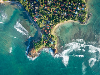 Aerial view of beautiful seascape with fishermen village in sri lanka