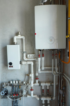 mounted communications in a built house. Gas boiler, heated floor, counters, sockets, water pump, heating, plastic pipes...