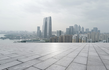 empty brick floor and cityscape of modern city near , shuzhou,