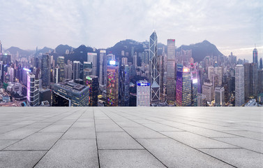 empty brick floor and cityscape of modern city near,hong kong