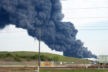 HOUSTON — A fire at a Houston-area petroch Petrochemical Fire. A plume of smoke rises from a...