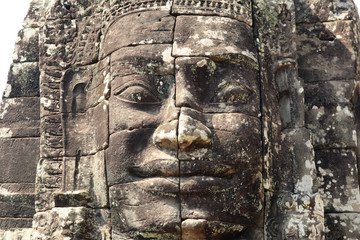Fototapeta na wymiar Angkor Wat Ancient Face and Sculpture Texture