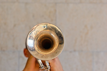 Unrecognizable musician plays trumpet