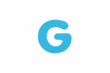 Alphabet letter G symbol of sponge rubber isolated over white background.