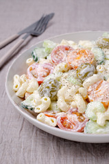 Salad with pasta and raw vegetables