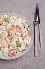 Salad with pasta and raw vegetables