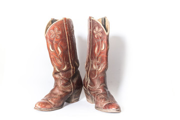 Old leather shoes on a white background