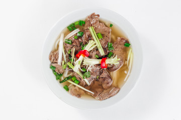 Traditional oriental cuisine of  Vietnam. Pho bo soup with rice noodles, beef, pepper, wheat germ,...