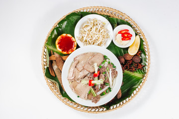 Traditional oriental cuisine of  Vietnam. Pho bo soup with rice noodles, beef, pepper, wheat germ, greens