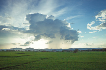 Pouring rain and dark clouds over the mountain