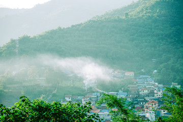 Village in mountain which people is burning.