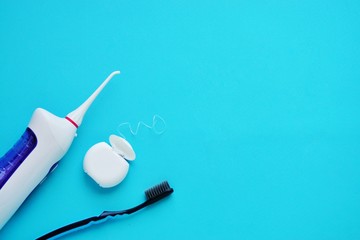 Oral hygiene, dental hygiene using dental tools, dental floss, irrigator, brush, chewing gum.