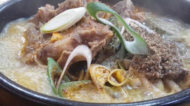 Korean Pork bone Soup served on hotpot. Sometimes called hangover soup.