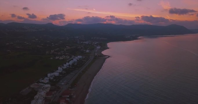 Aerial Flight Facing Akamas Penisula In Cyprus During Sunset.