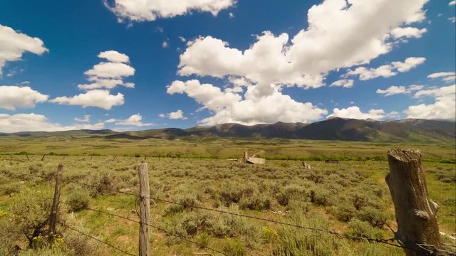 A time-lapse in the Rocky Mountains of Colorado off of Hwy 285. Streaming clouds and blue sky.