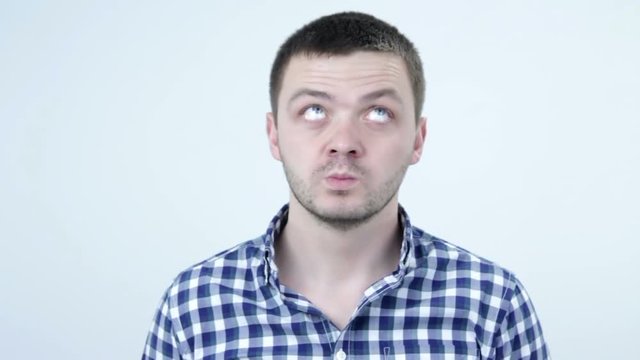 Man is moving his eyes in circle