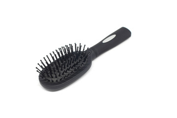 black hairbrush on white background