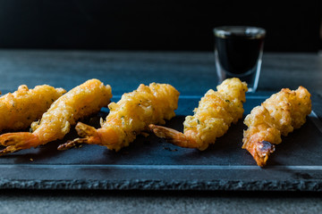 Shrimp Tempura with Soy Sauce on Black  Stone Board.