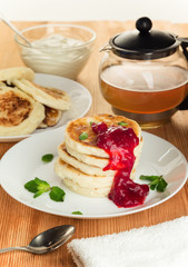 Cottage Cheese Pancakes (Syrniki). Rich in protein and low carb food.
