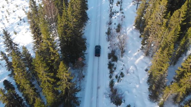 Car on winter roads, in the forest. Trysil, Norway.