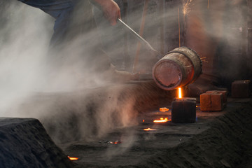 Obraz premium red high temperature fire metal casting method