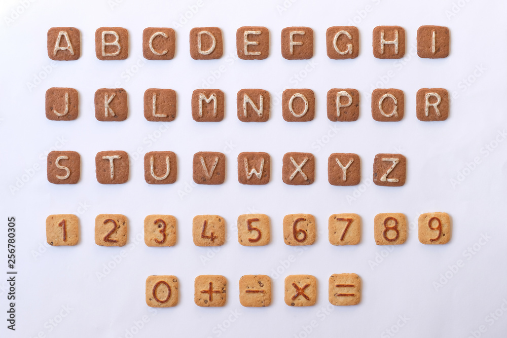 Fototapete a set of letters and numbers from cookies. alphabet and numbers.