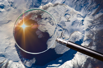 Mount Nemrut, Turkey, exploring through a magnifier. Elements of this image furnished by NASA.