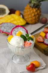 Ice cream with fresh tropical fruits.