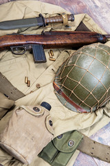 World War Two US military equipment with rifle