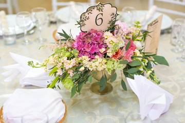 beautiful bouquet of flowers on the wedding table