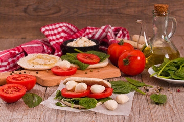 Tigella bread with spinach and tomatoes. 