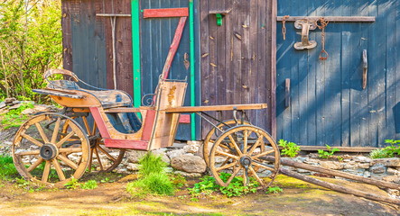 Antique wooden wagon in  old barn