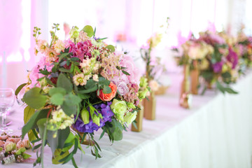 beautiful bouquet of flowers on the wedding table