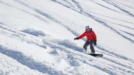 Snowboard rider shredding powder