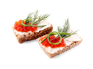 Tasty canapes on white background