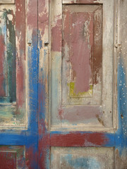 multi colored wooden door in the streets of Gallipoli Italy