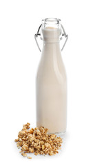 Tasty oat milk on white background