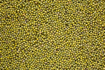 Raw green mung beans texture, close-up.