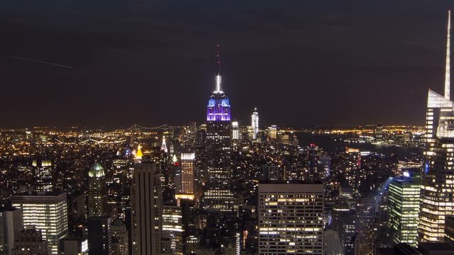 tilting up Manhattan cityscape day to night Empire State Building New York City NYC