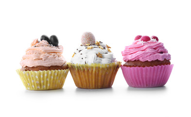 Tasty Easter cupcakes on white background