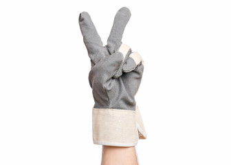 Worker showing gesture - two fingers, victory sign. Male hand wearing working glove with, isolated...