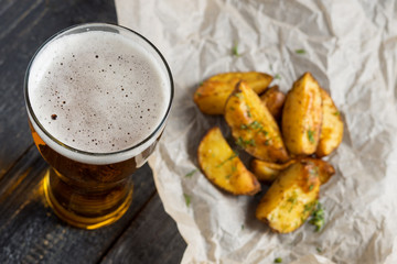 Fried potatoes snack with beer