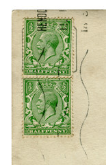English historical stamp: green half penny stamp with a portrait of the King of the United Kingdom and the British Dominions, and Emperor of India, George V, cancellation, Royal mail