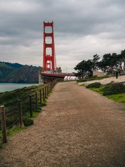 Golden Gate Bridge. From the park with blue skies and City of San Francisco in the background