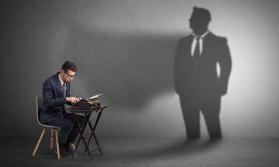Shadow threatening hard worker man who is afraid
