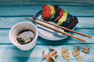 Asian dumplings with soy sauce Sesame seeds and Plate of Japanese gyoza Traditional chinese dim sum...