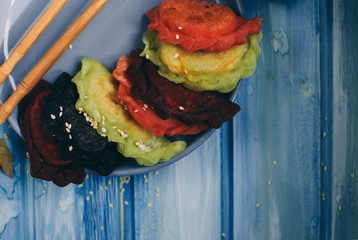 Asian dumplings with soy sauce Sesame seeds and Plate of Japanese gyoza Traditional chinese dim sum...